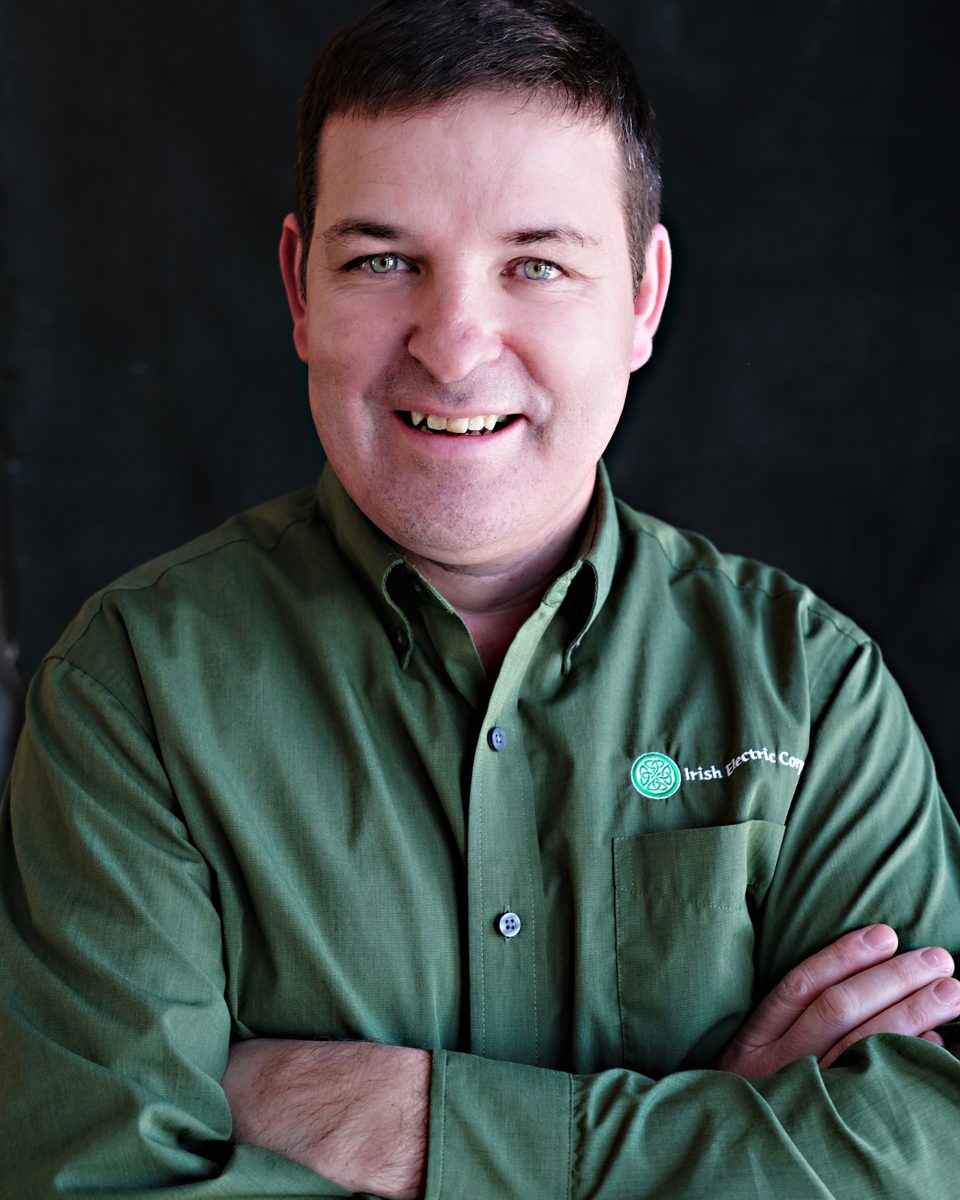Darragh Madden, founder of Irish Electric, in a green company shirt